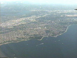 Flying over Puget Sound south from Seattle Washington