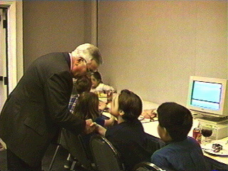 Orange County Public Schools Superintendent Donald Shaw greeting students at the Governor's Summit January 1997 Orlando Florida