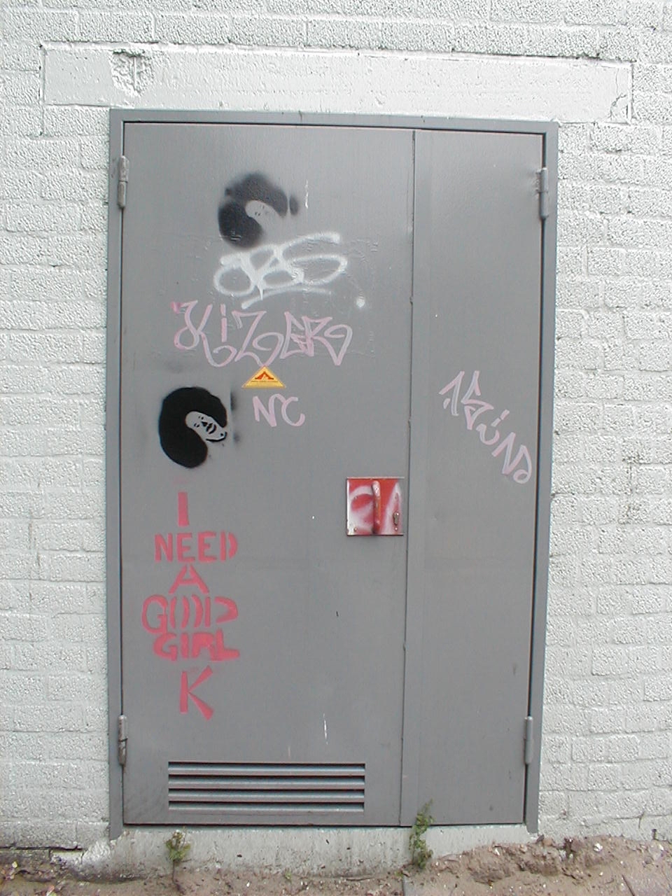 dario metal door graffiti wall