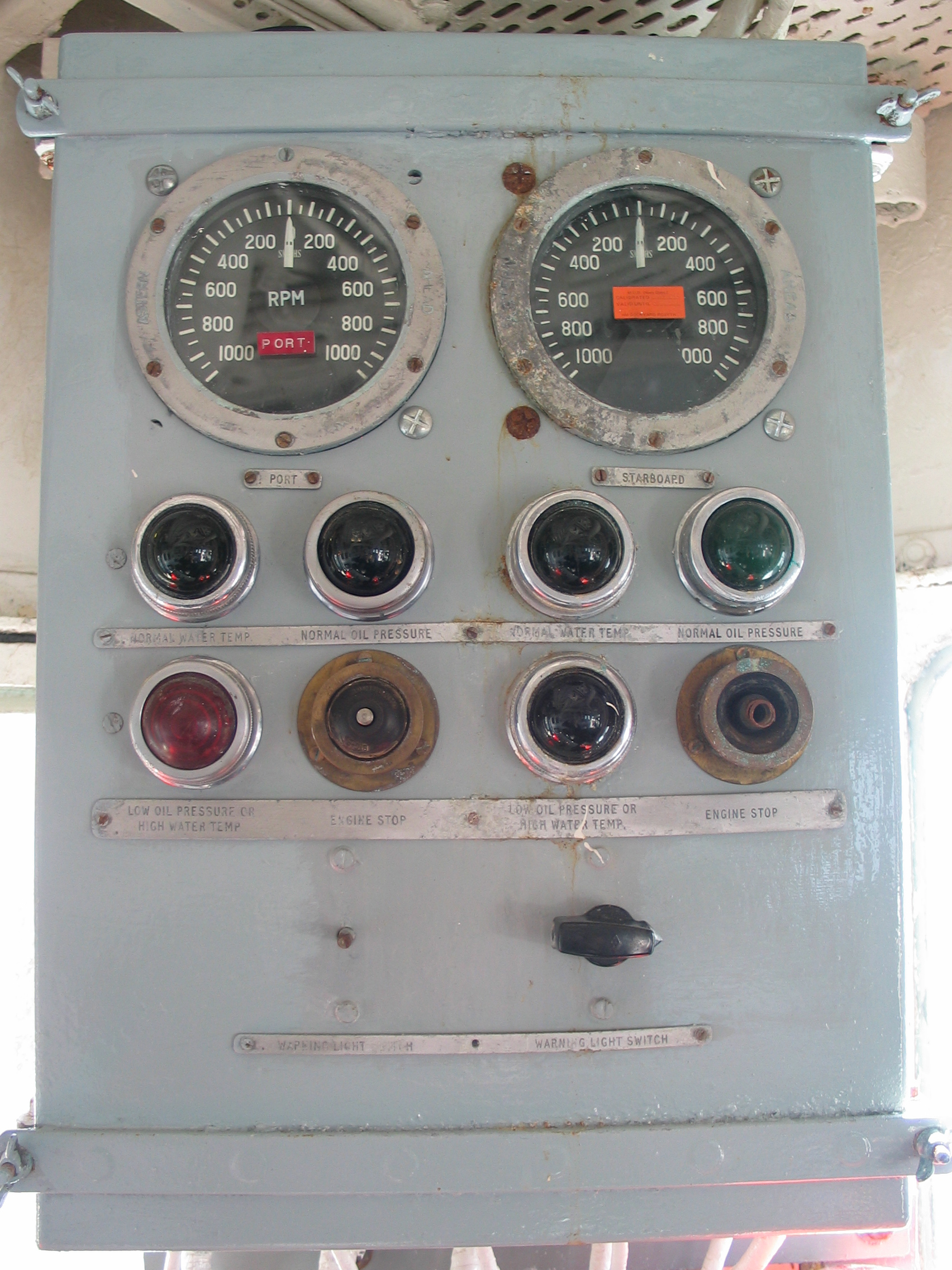 iain dials knobs switches control panel from a ship lights gauges