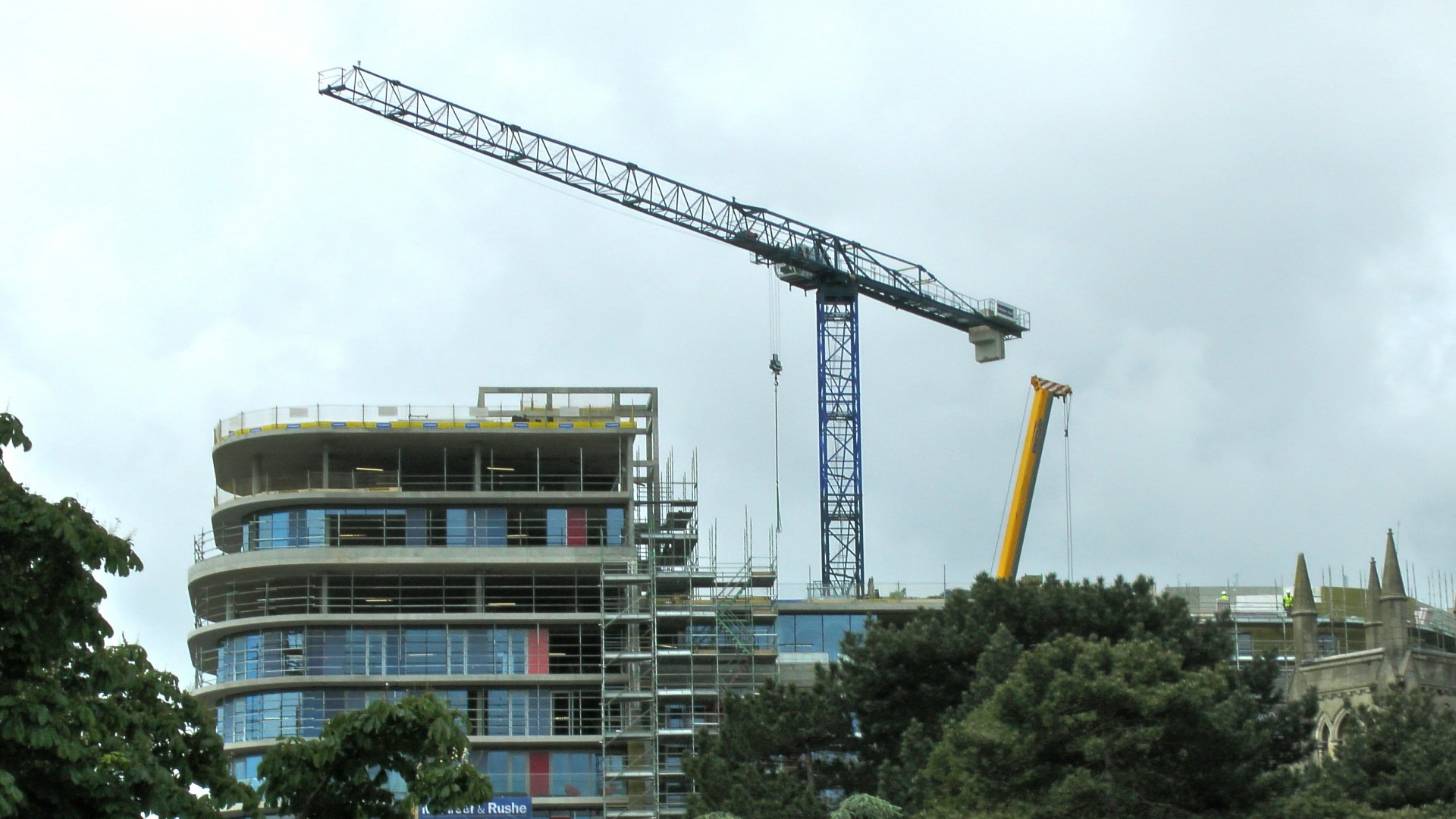 Construction Site Above The Trees Free Stock Photo - Public Domain Pictures