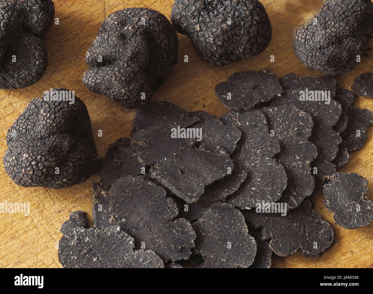 Perigord truffle,black truffle,tuber melanosporum,fungi,chopped,thin slices Stock Photo - Alamy