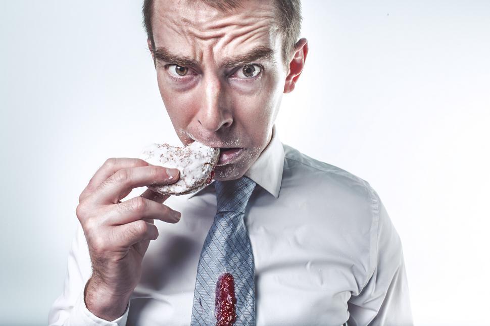 Businessman with doughnut