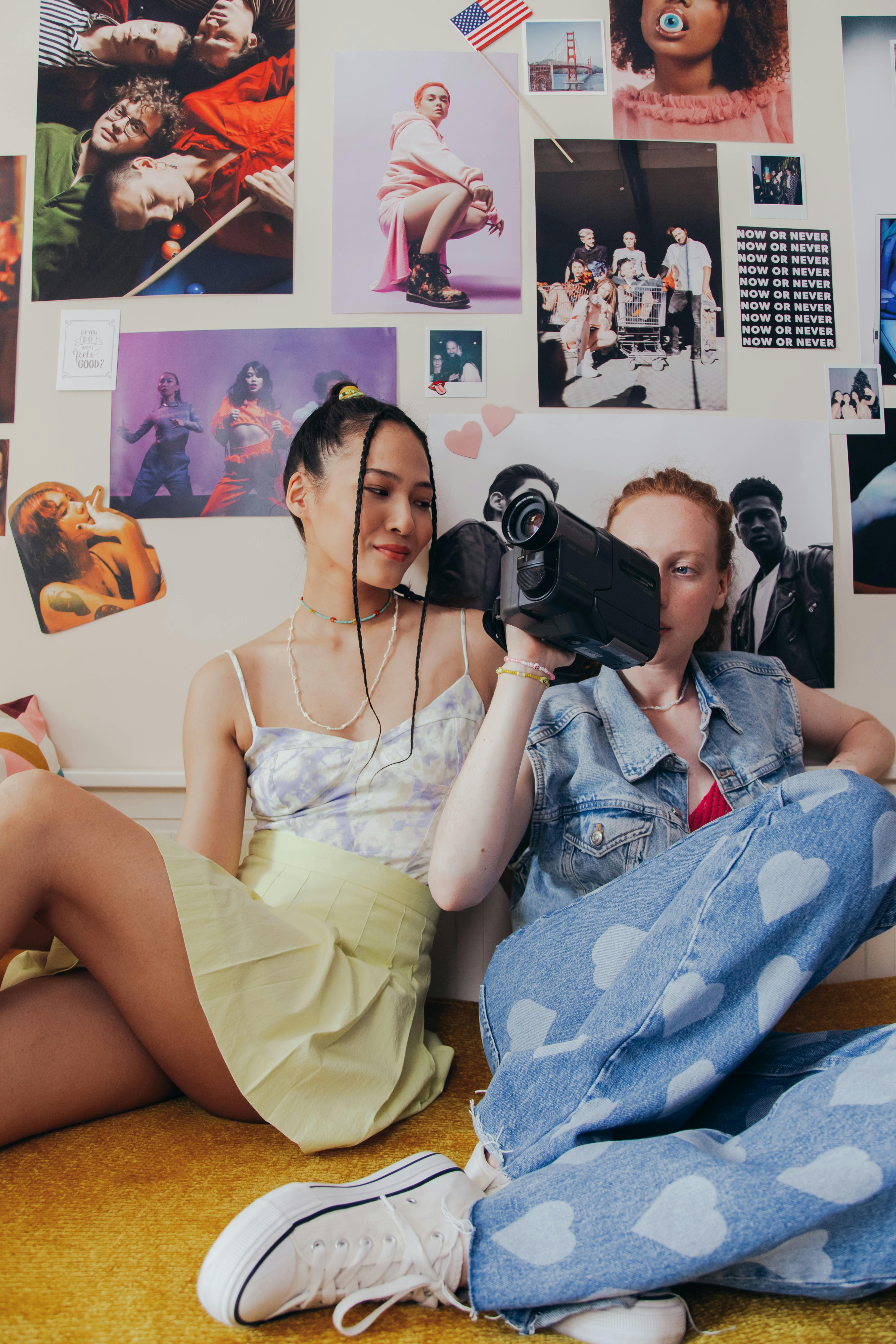 teenage girls sitting on a bed