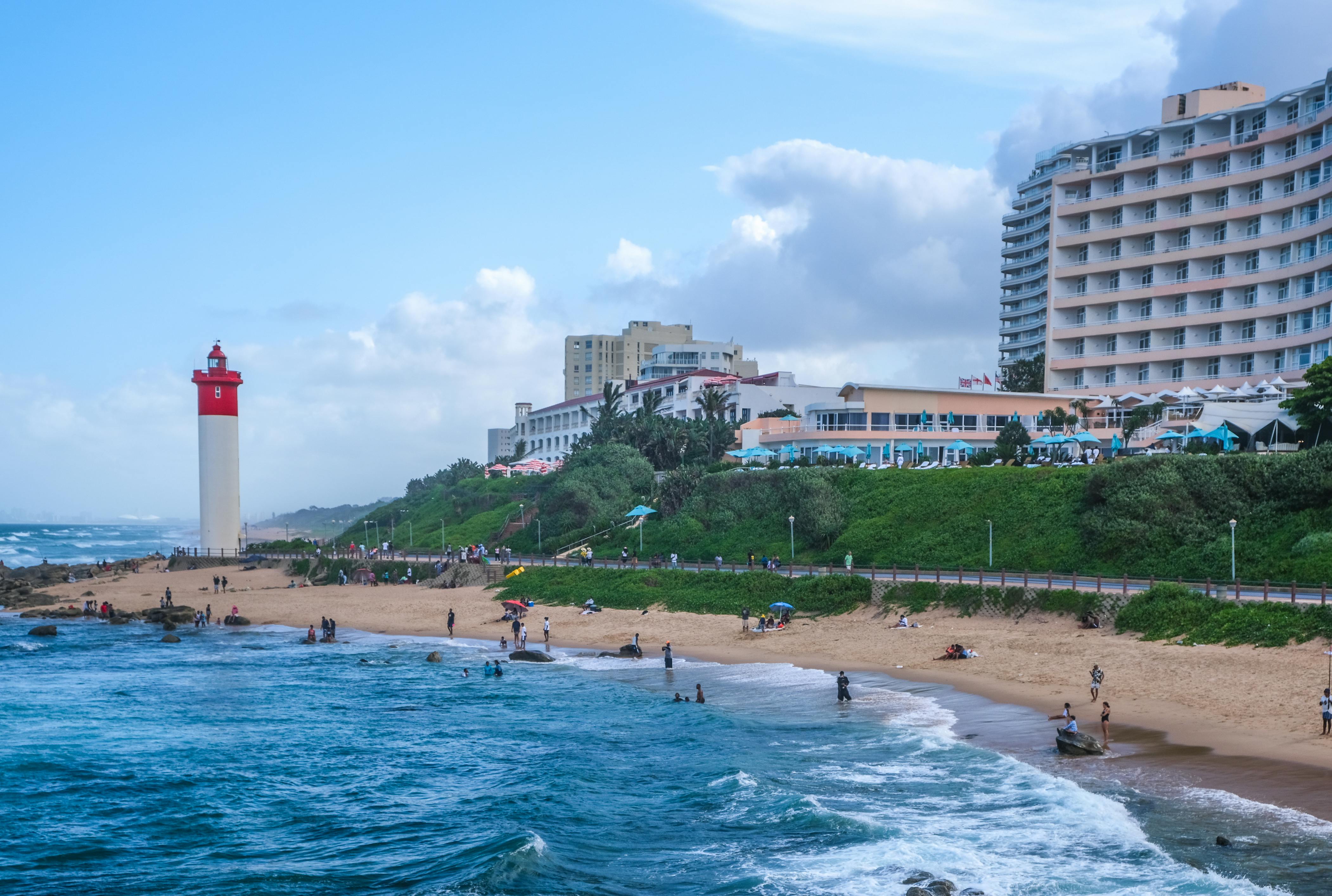 people on the beach in umhlanga south africa