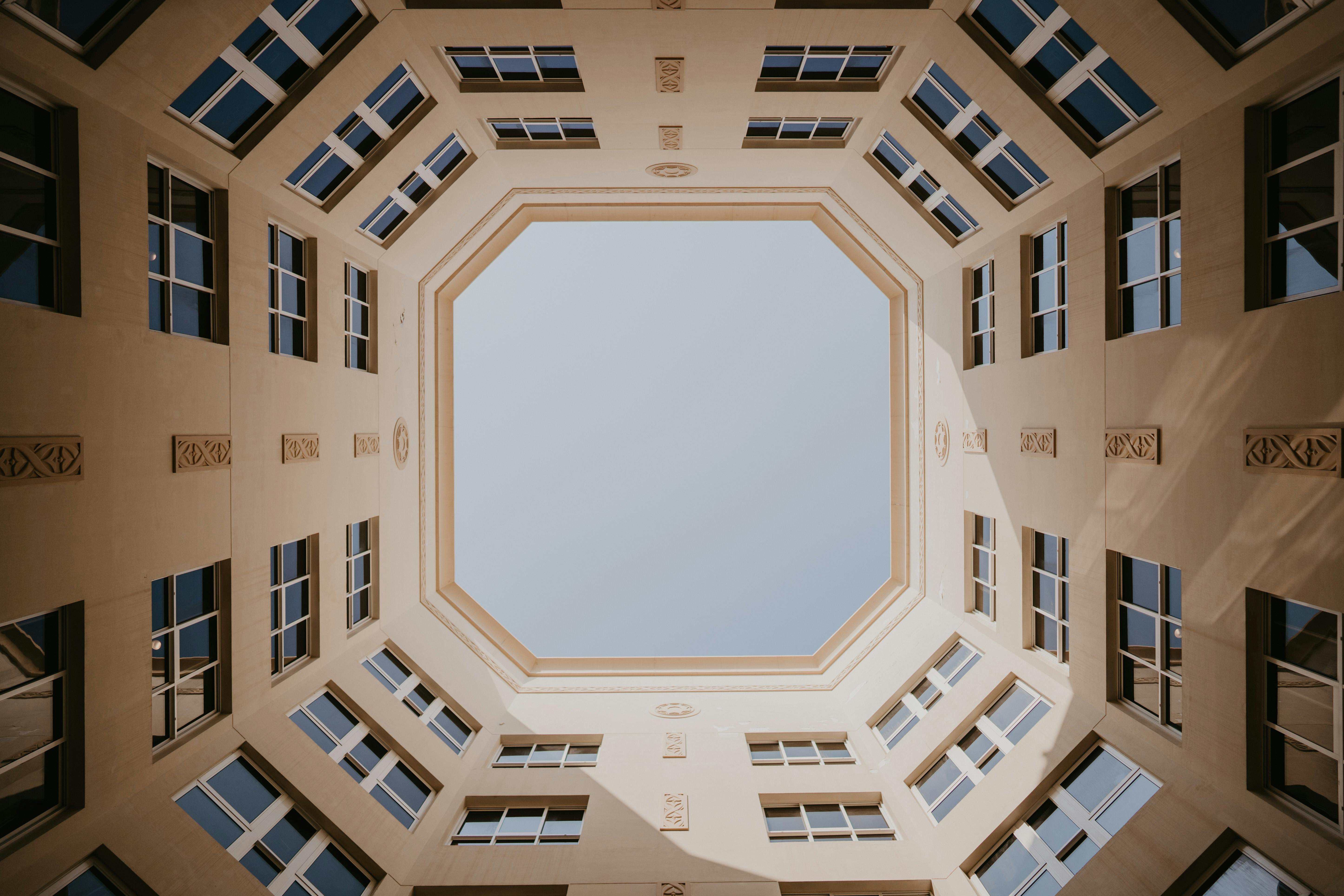 the view from the top of a building looking down