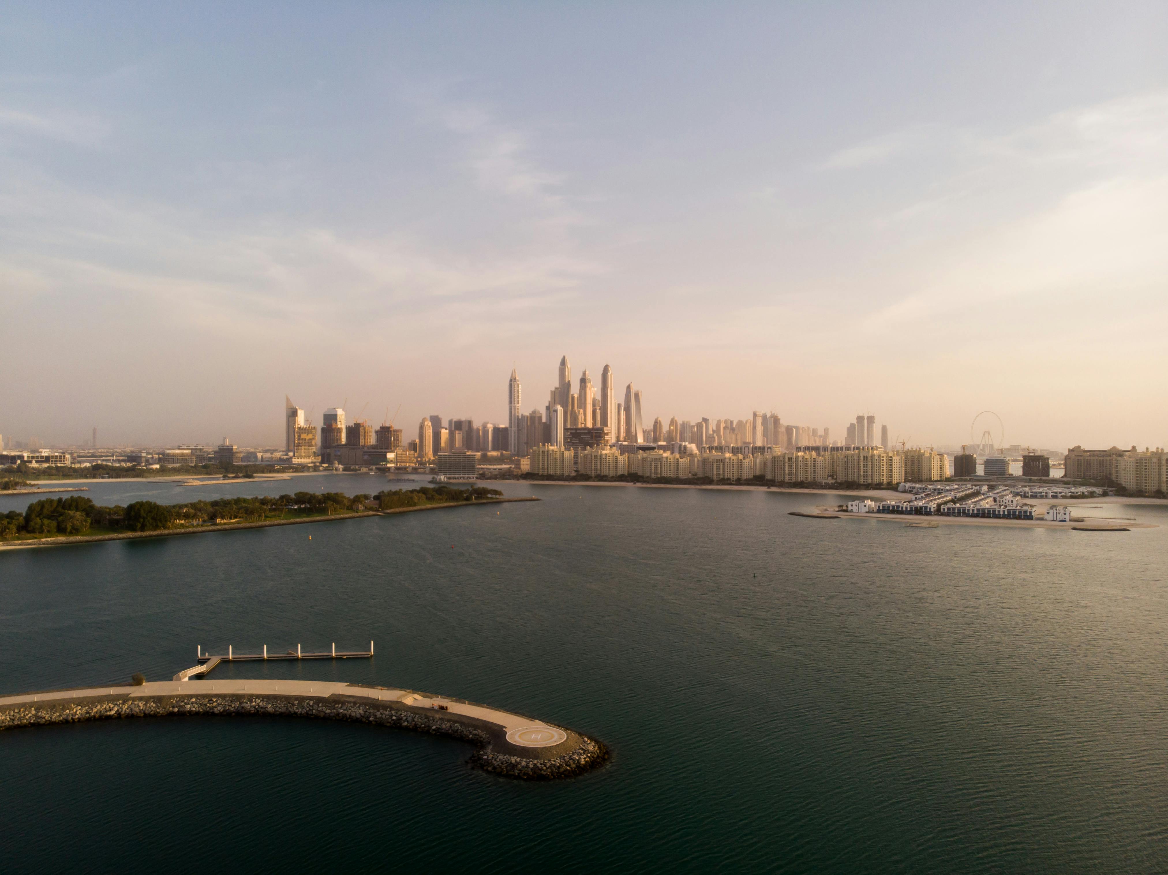 an aerial view of the city of dubai and the water