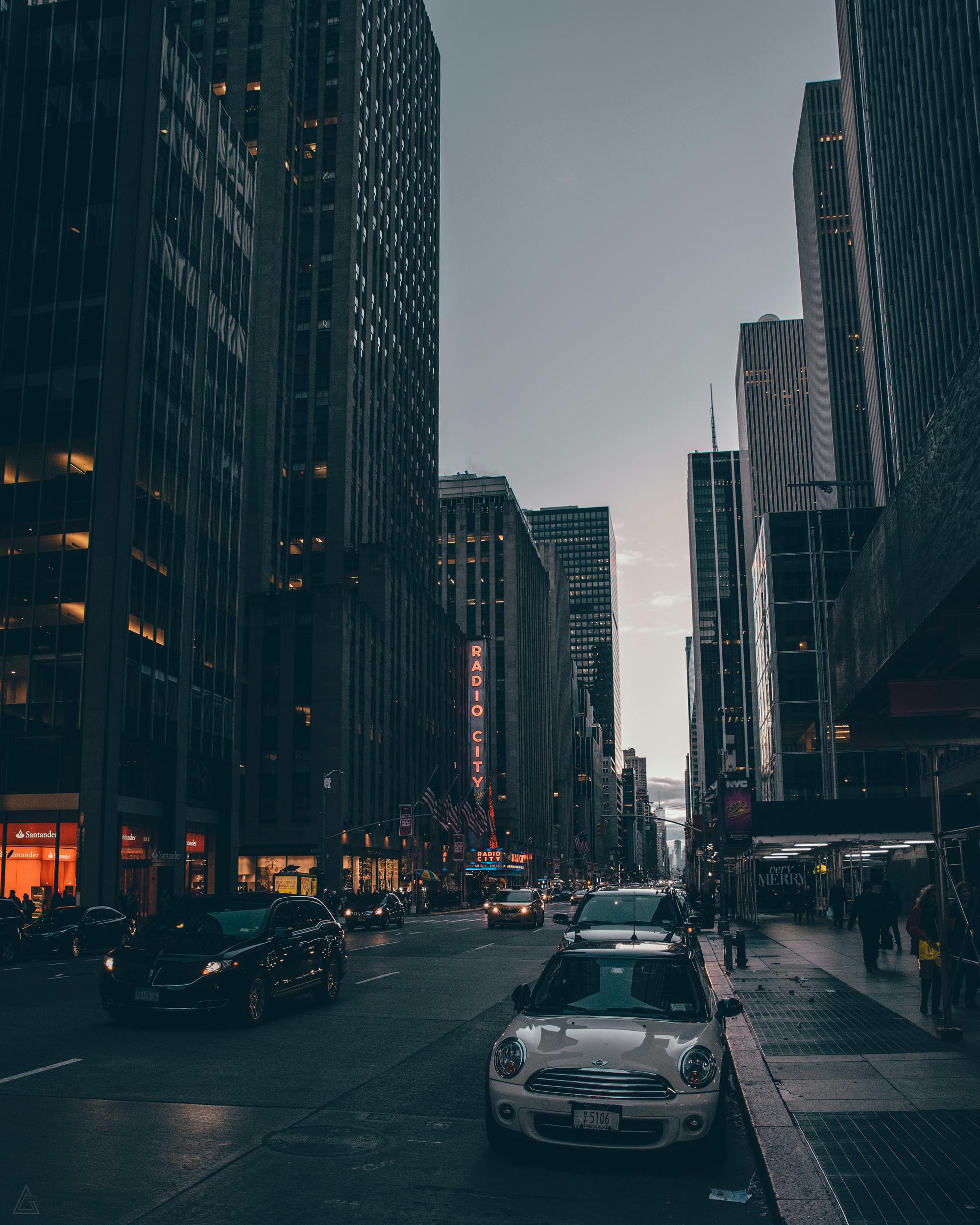 cars on road near buildings