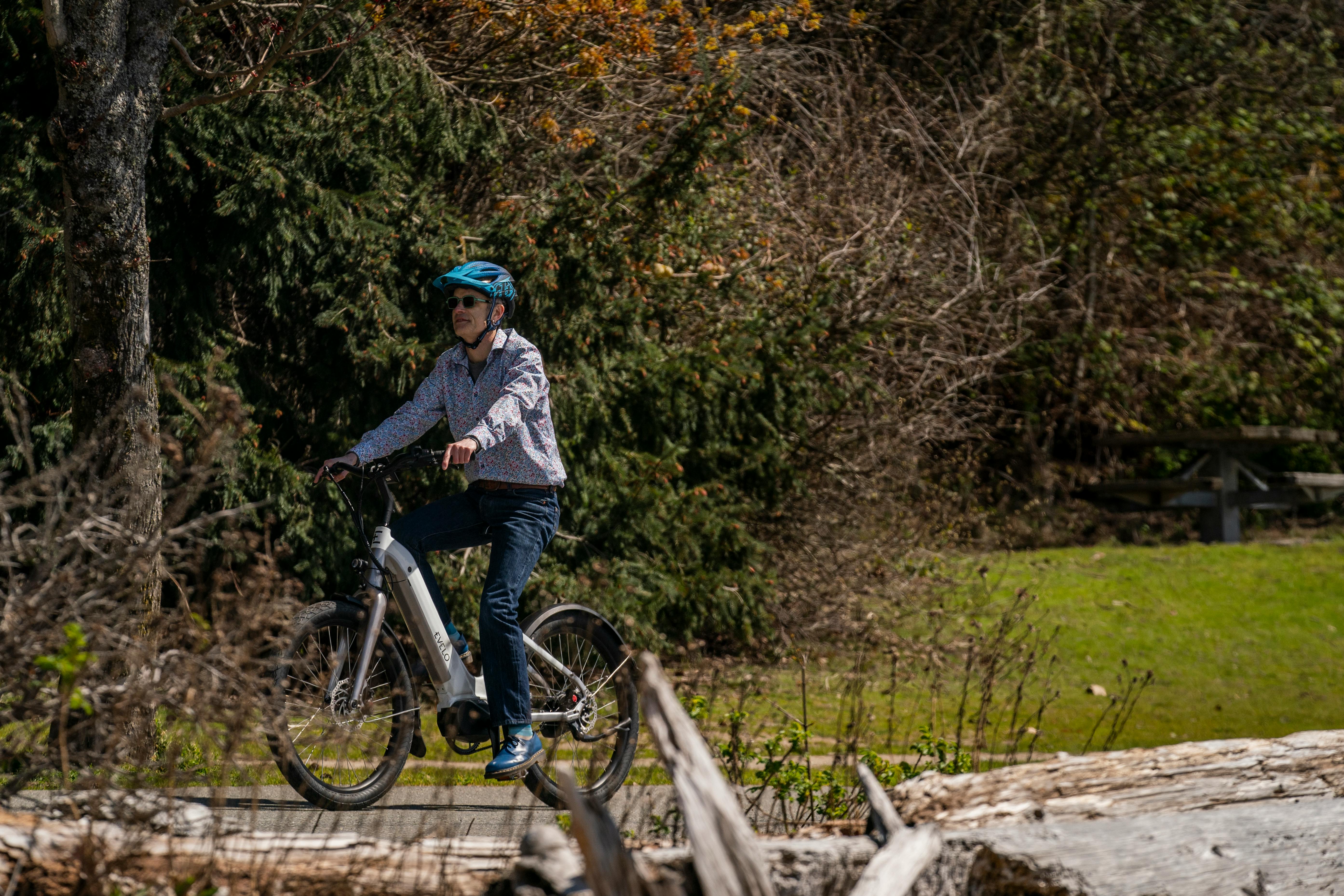 a person riding a bike on a trail