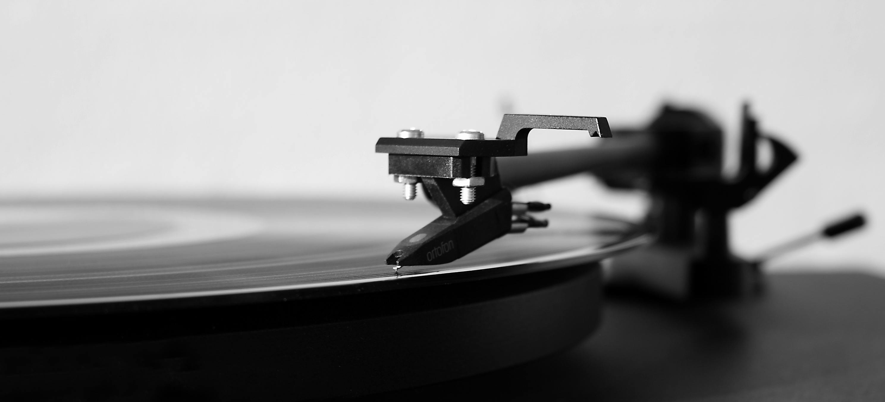 gray scale photography of turntable