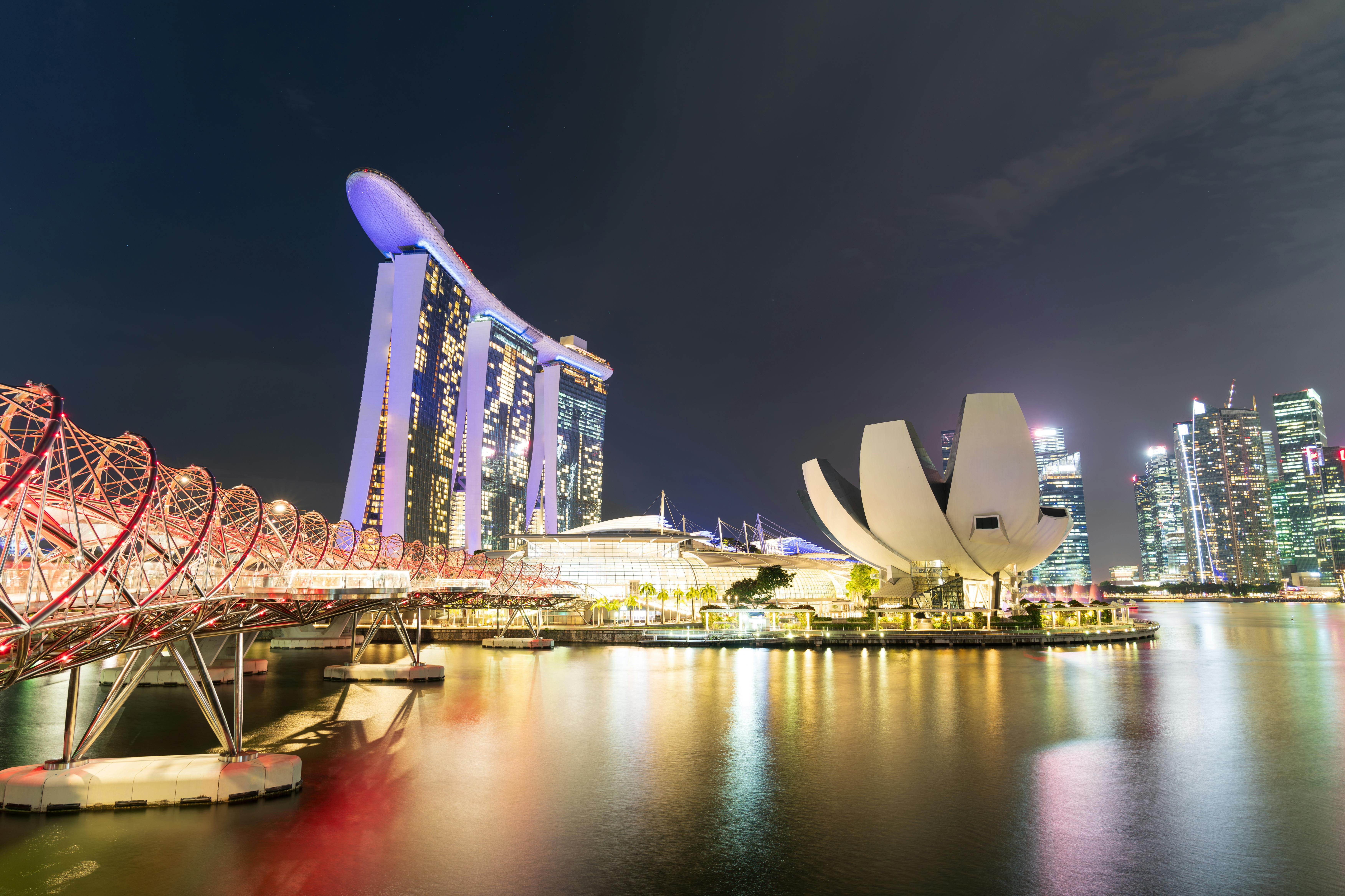 futuristic buildings of marina bay in singapore at night