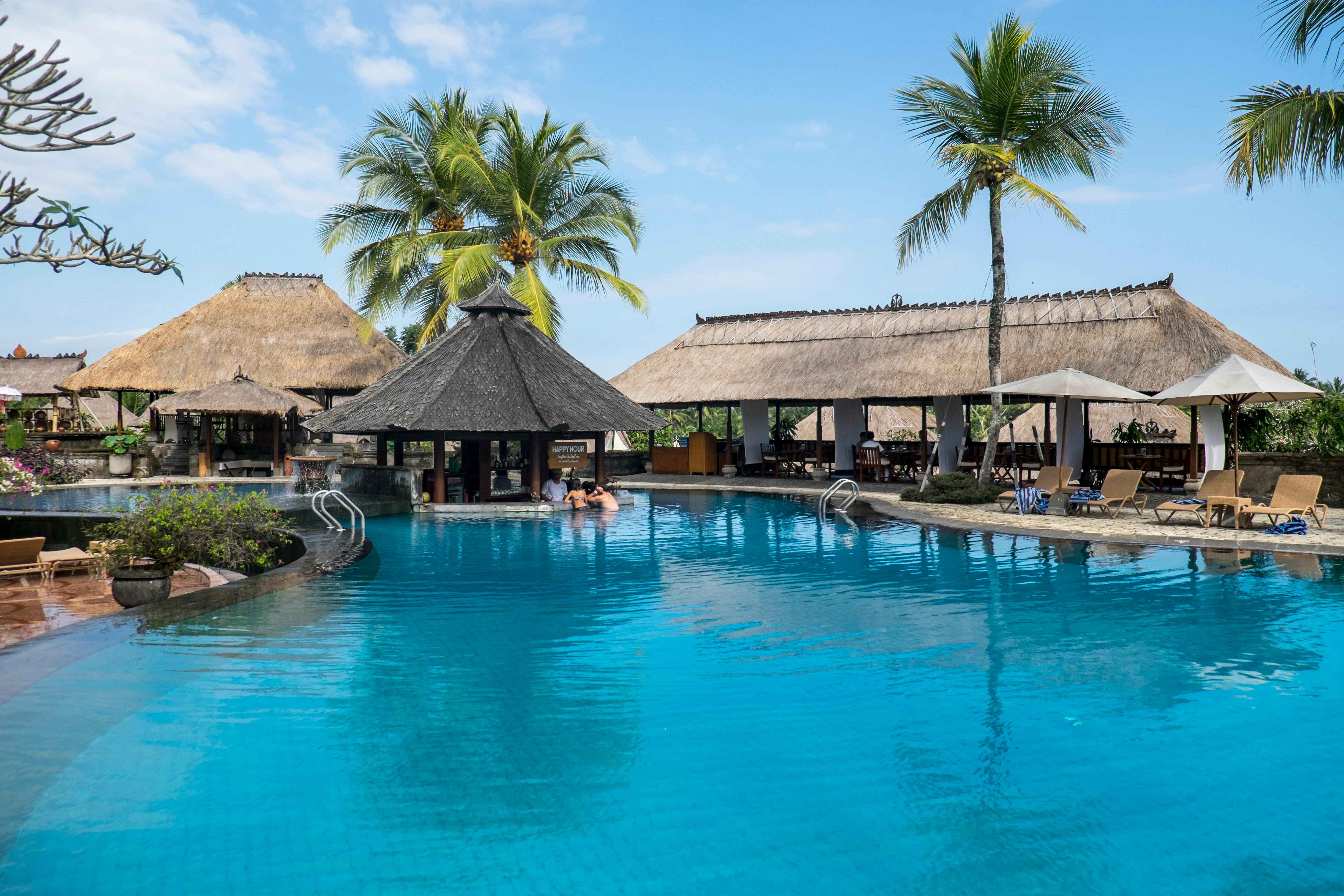 swimming pool beside cottages