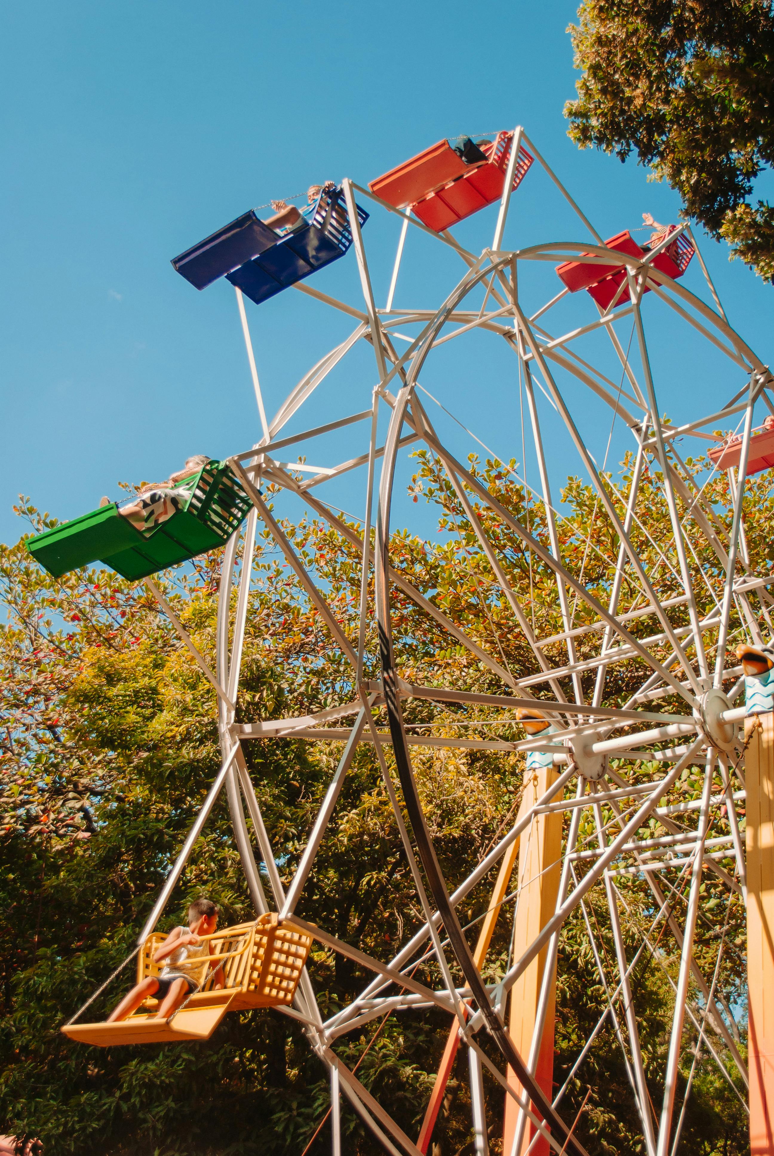 a ferris wheel with many colorful rides