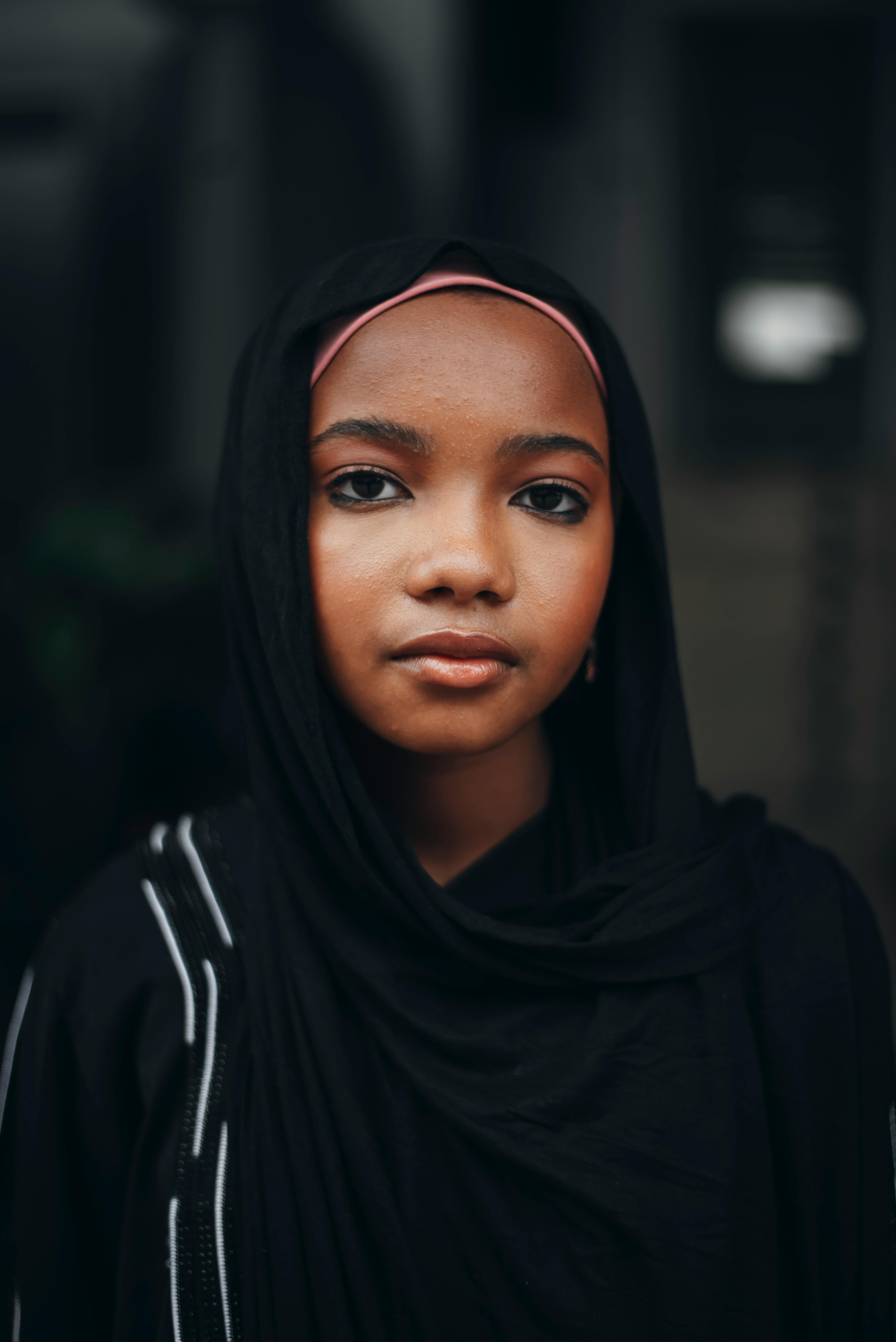 young nigerian woman in traditional hijab