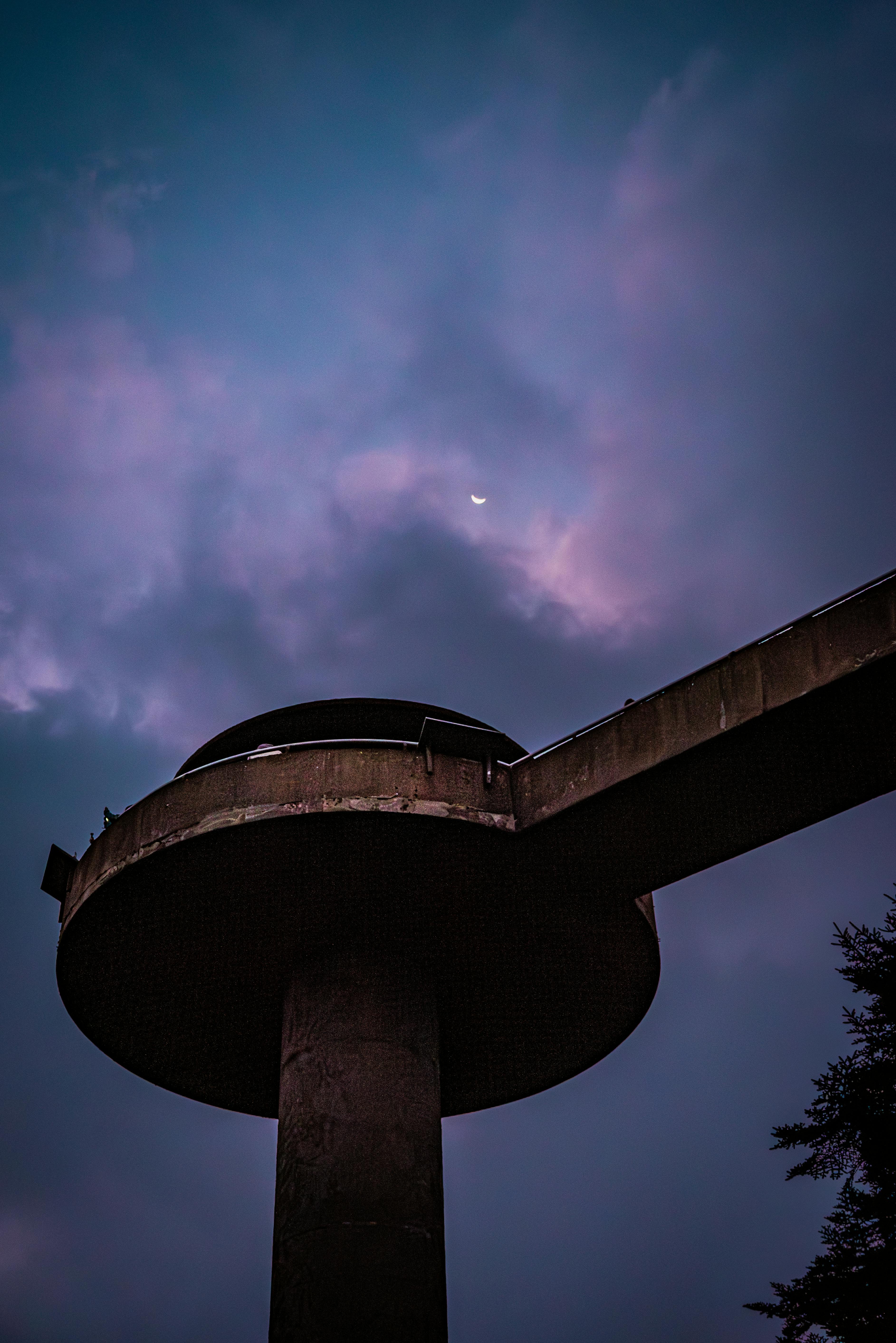 modern architecture silhouette with moonlit sky