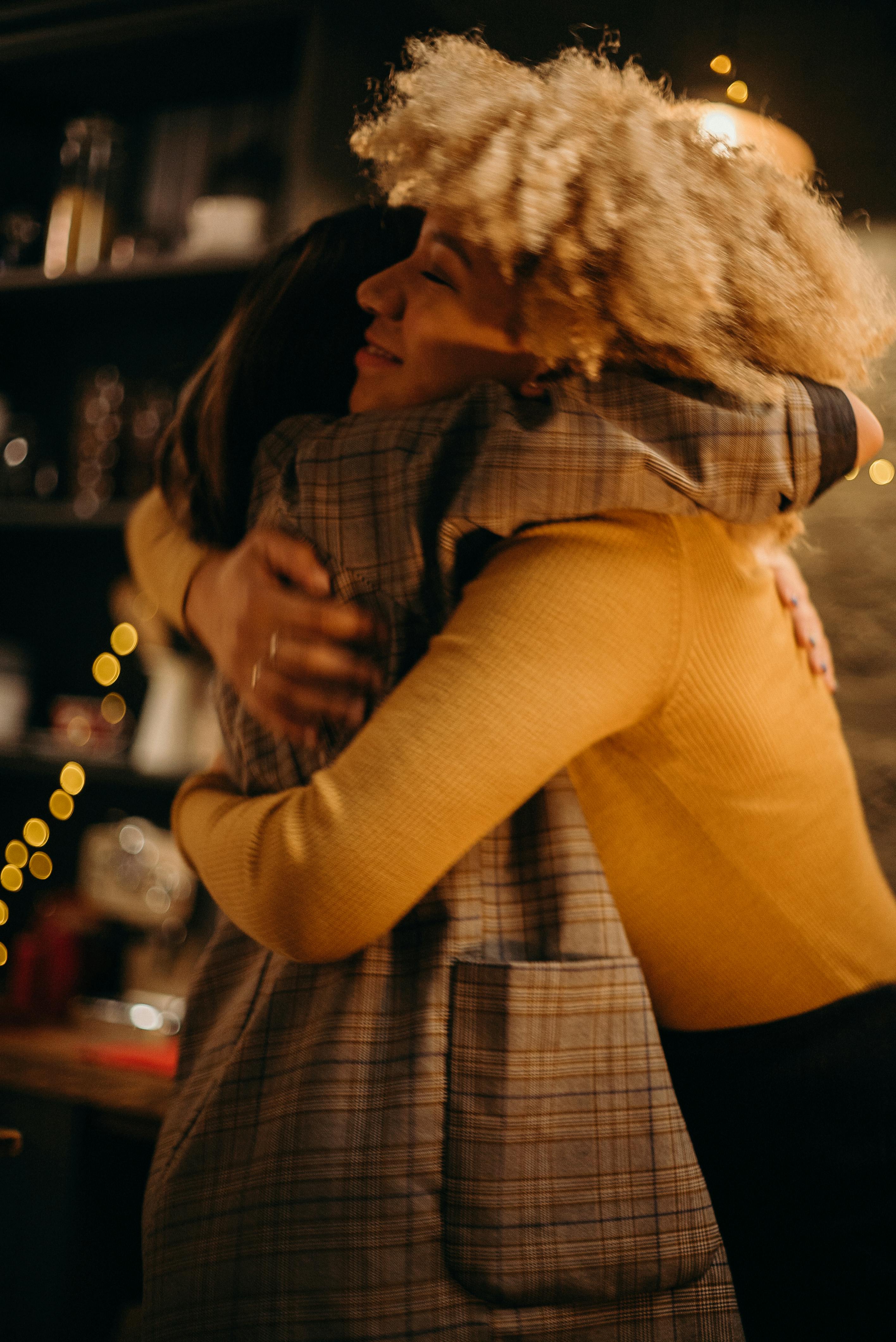 two person hugging photograph