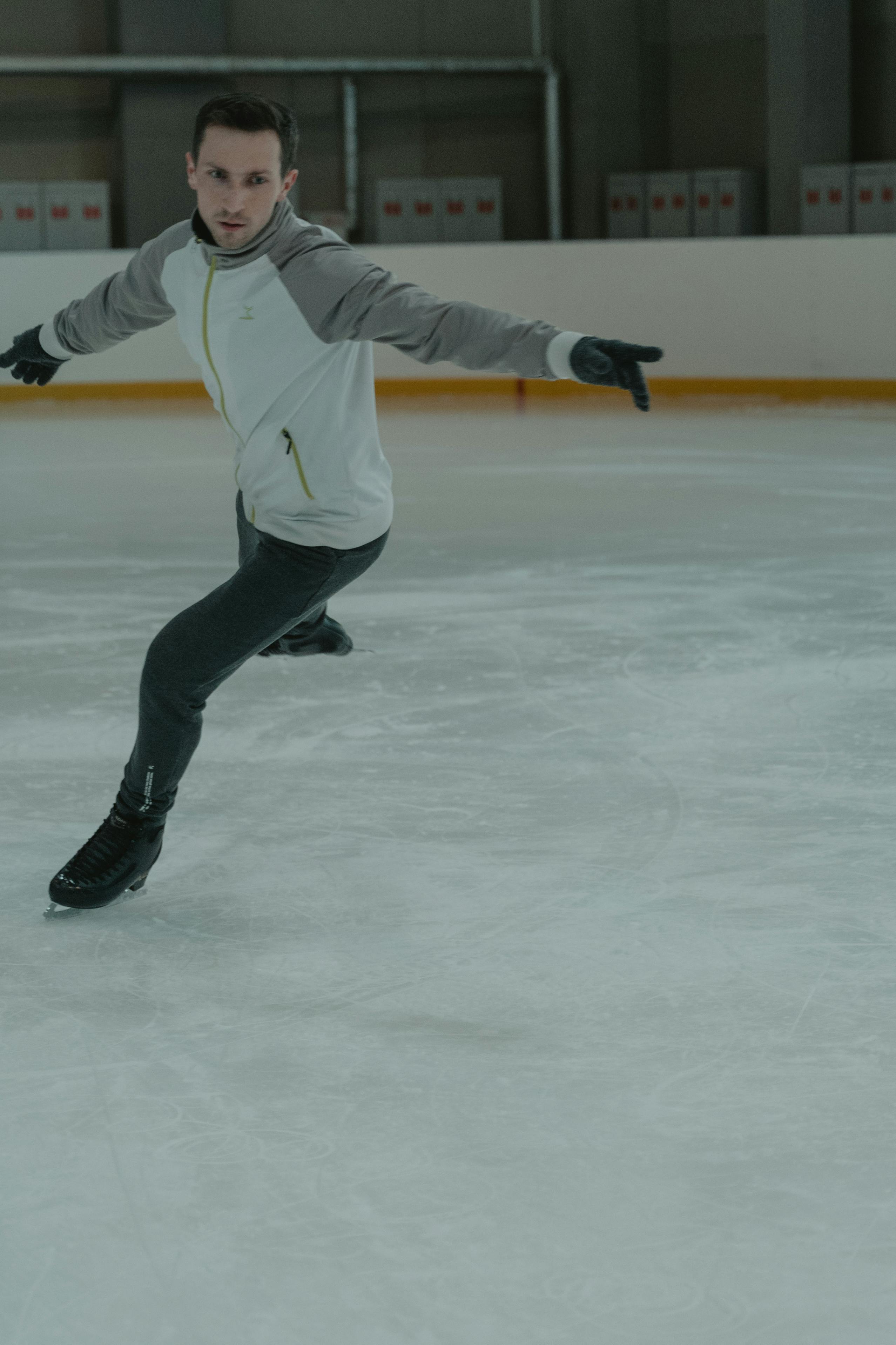 man preparing for ice skating competition