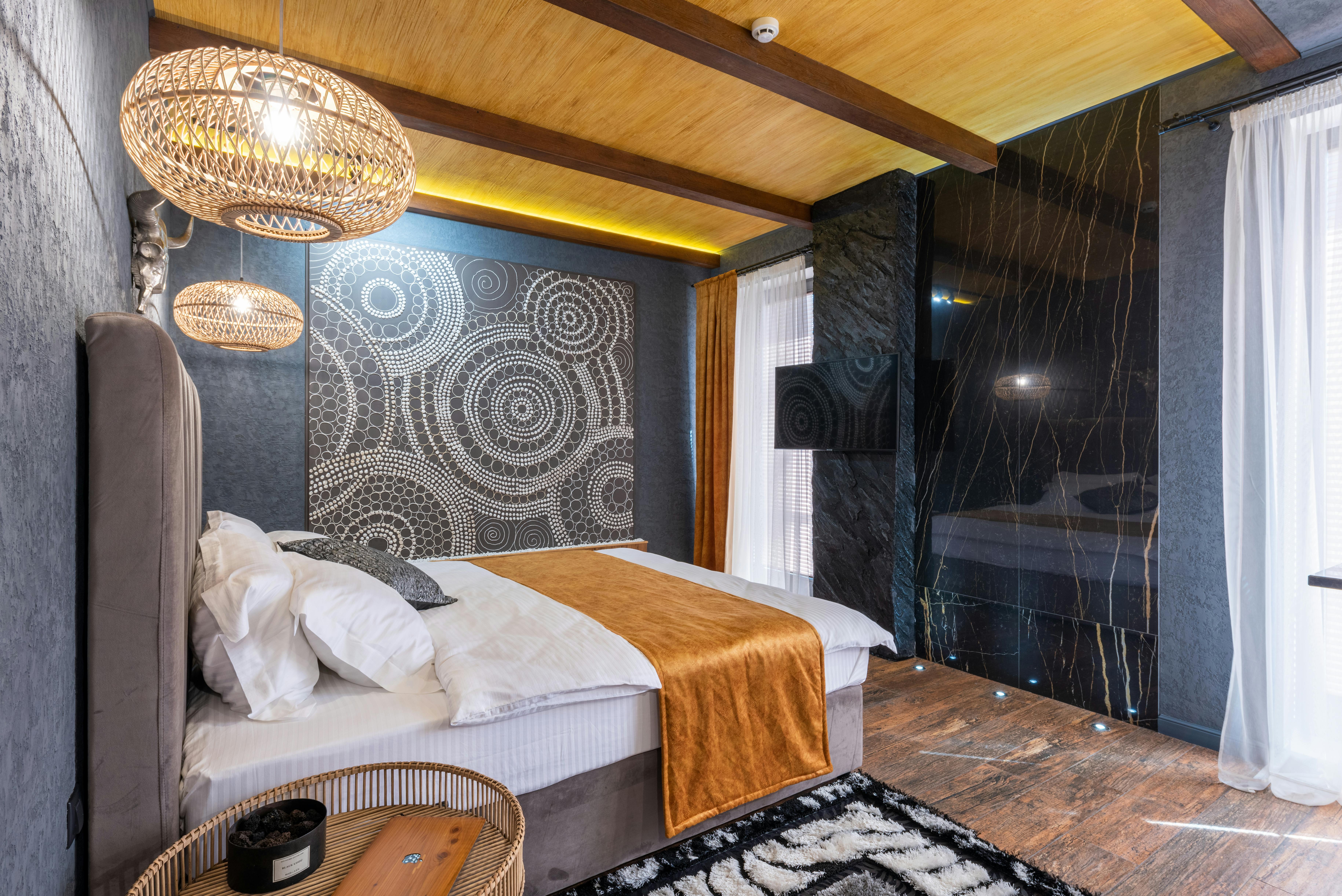 contemporary bedroom interior with oriental panel and glowing lamps