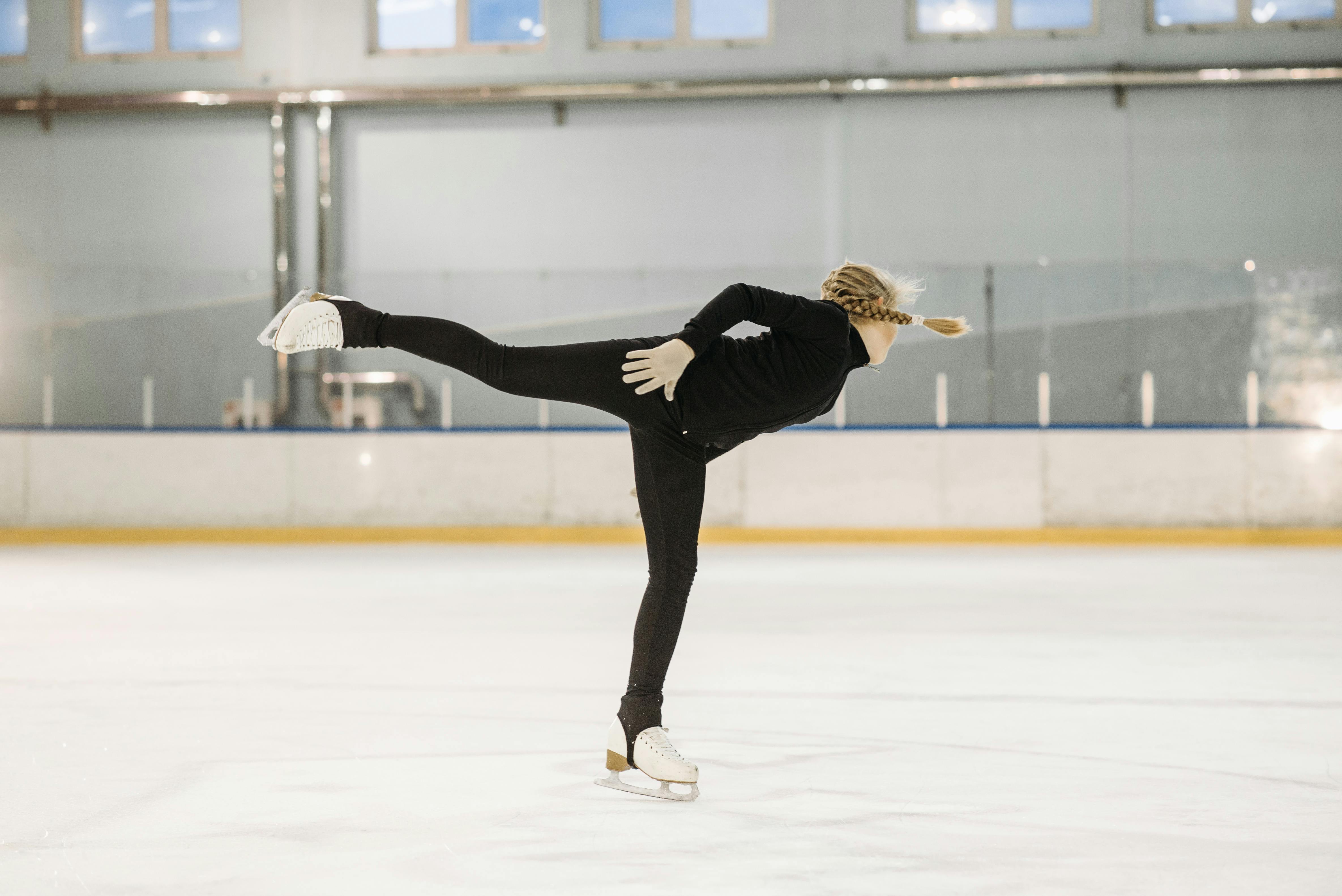 girl doing a figure skating move