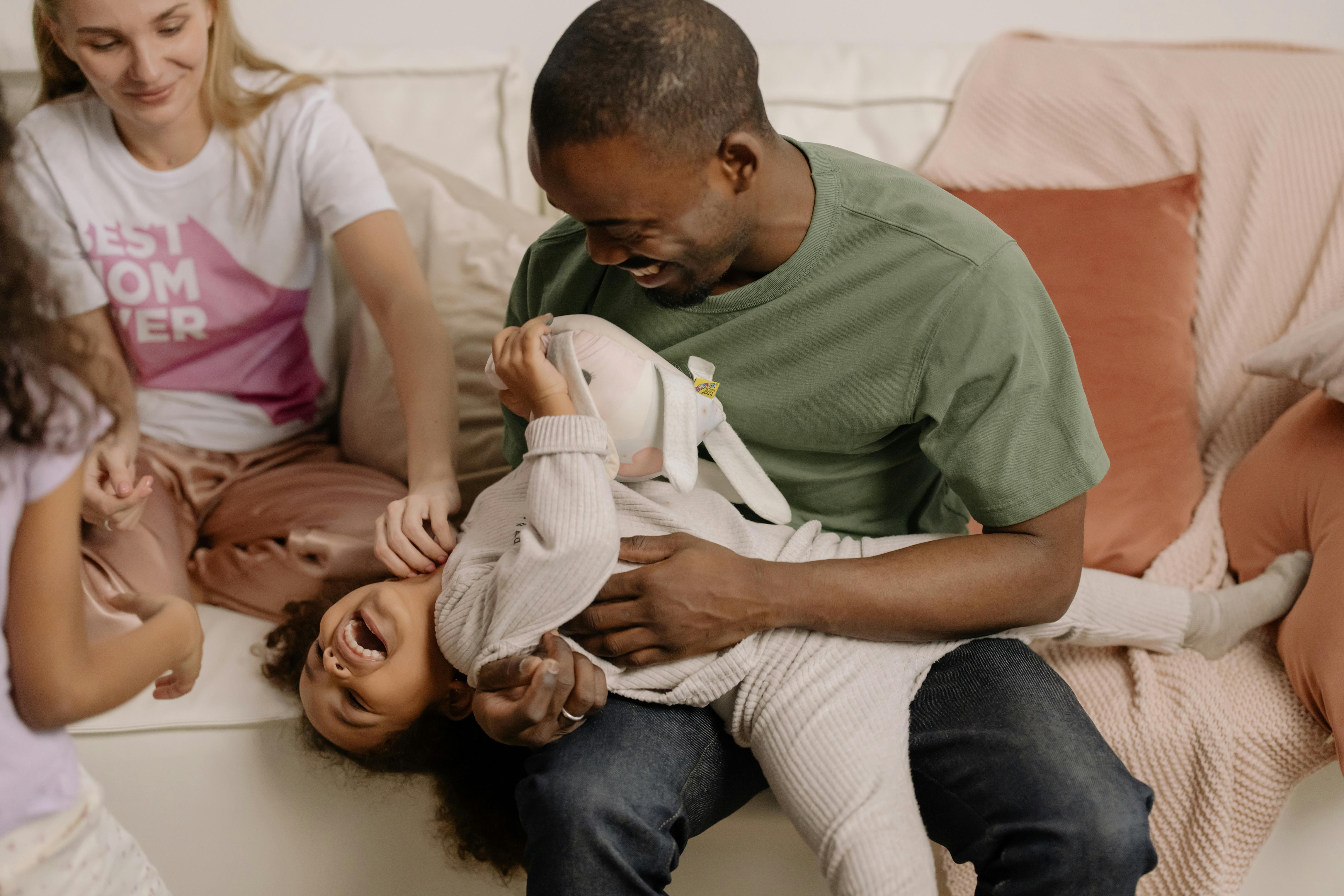 parents playing with children