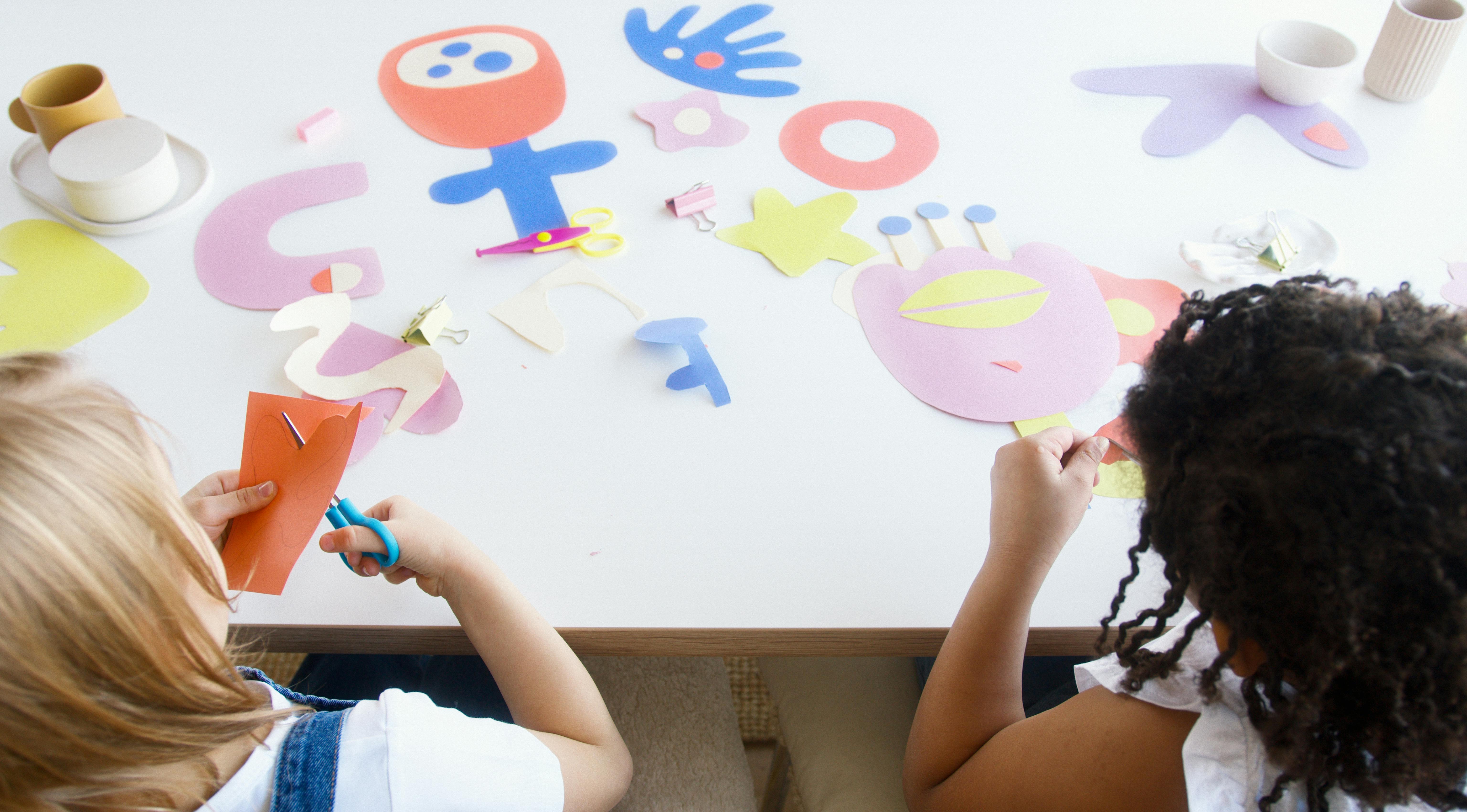 two kids doing some artworks