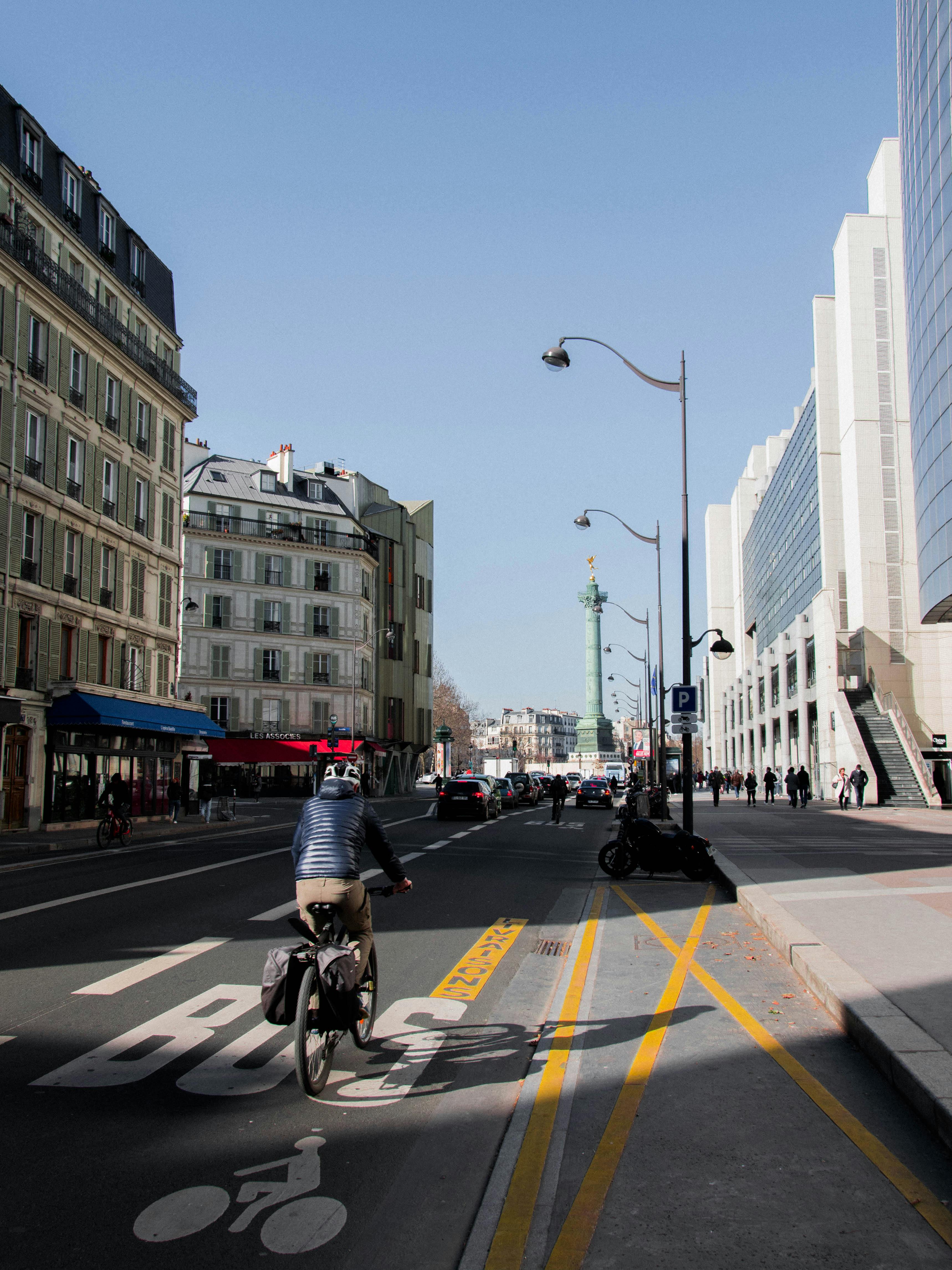 a person riding a bicycle on the road