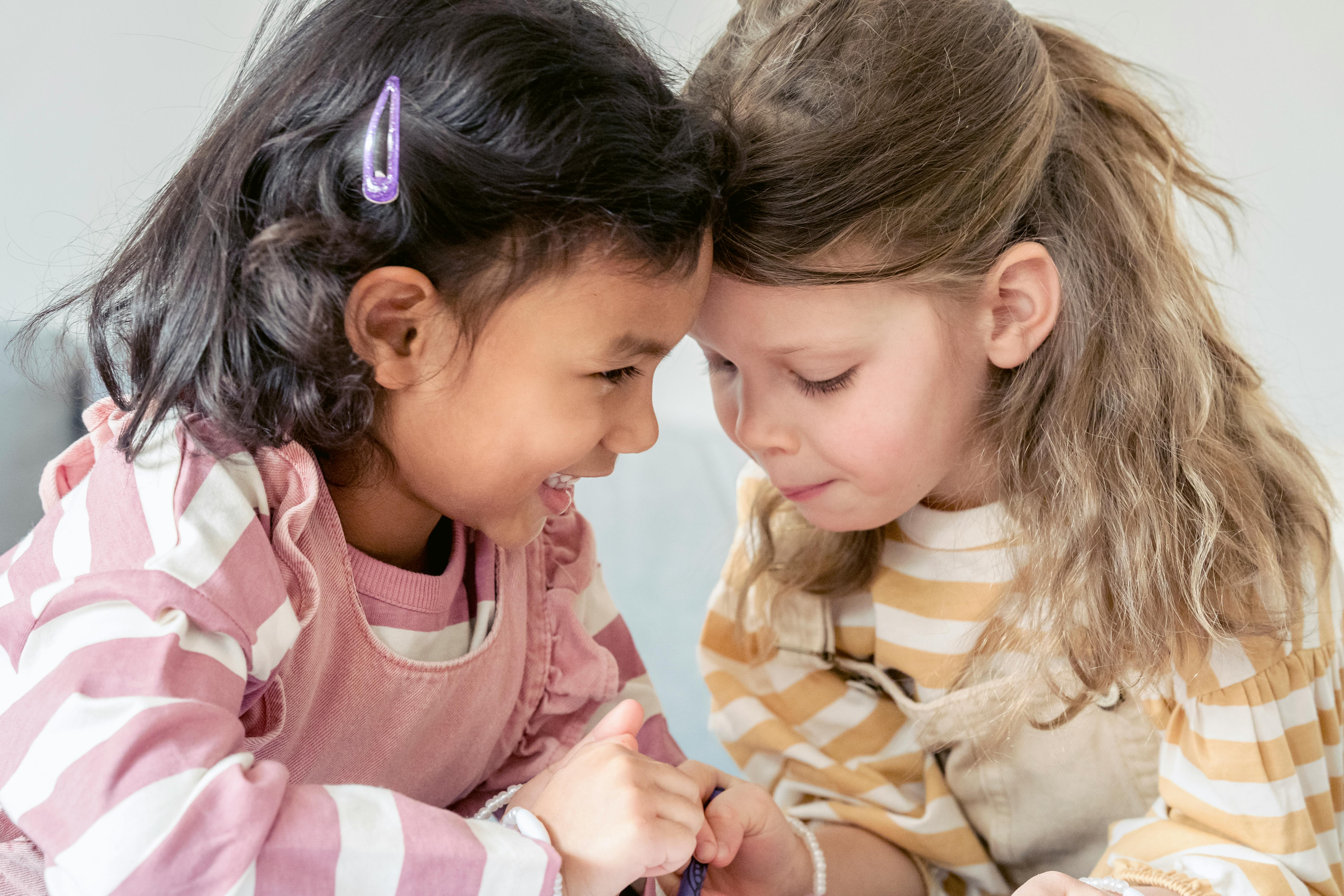 little multiracial friends playing together