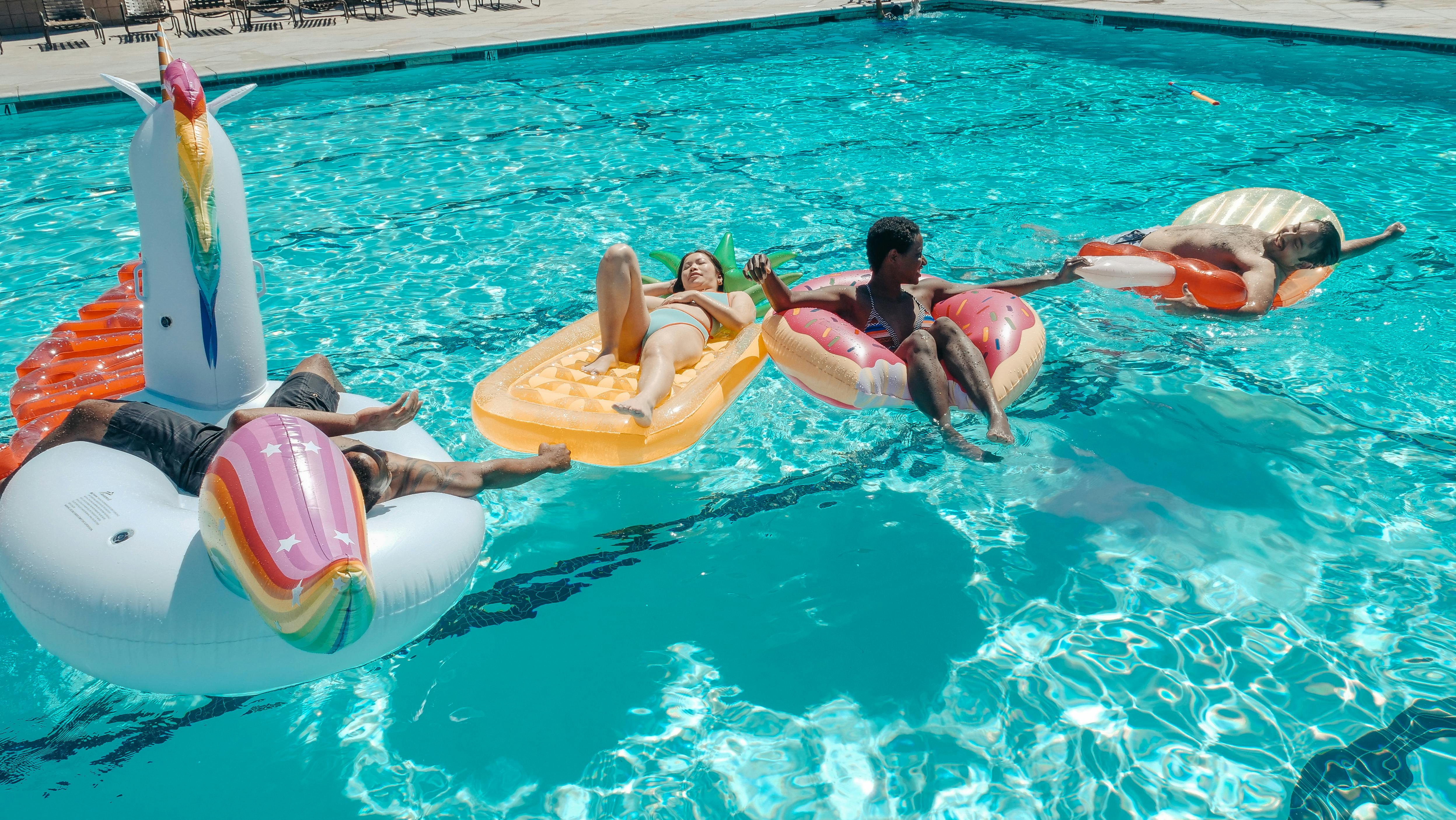 people swimming in the pool