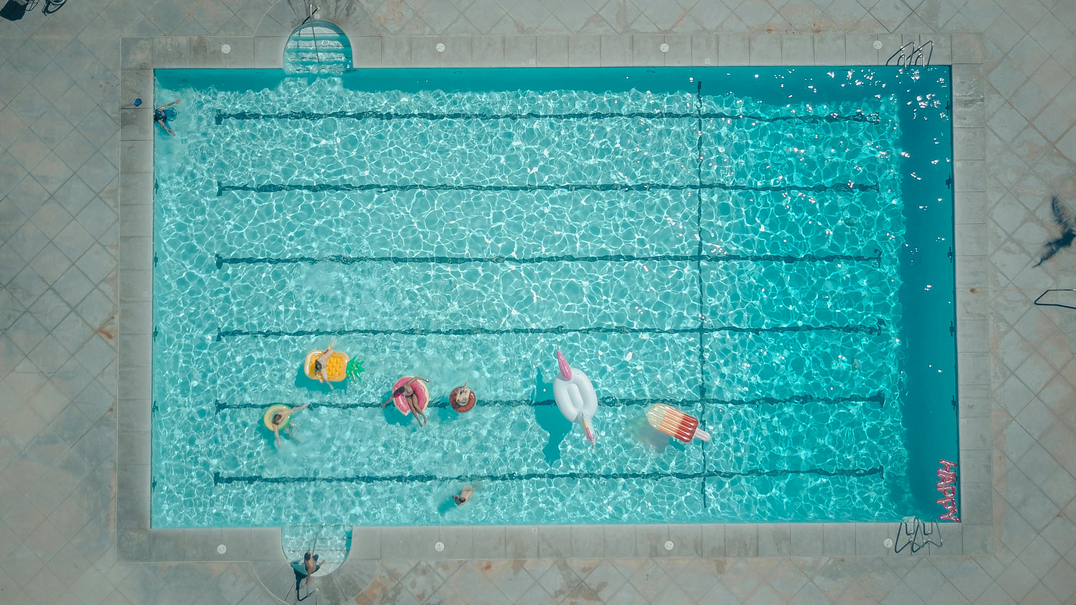 top view of people in the swimming pool