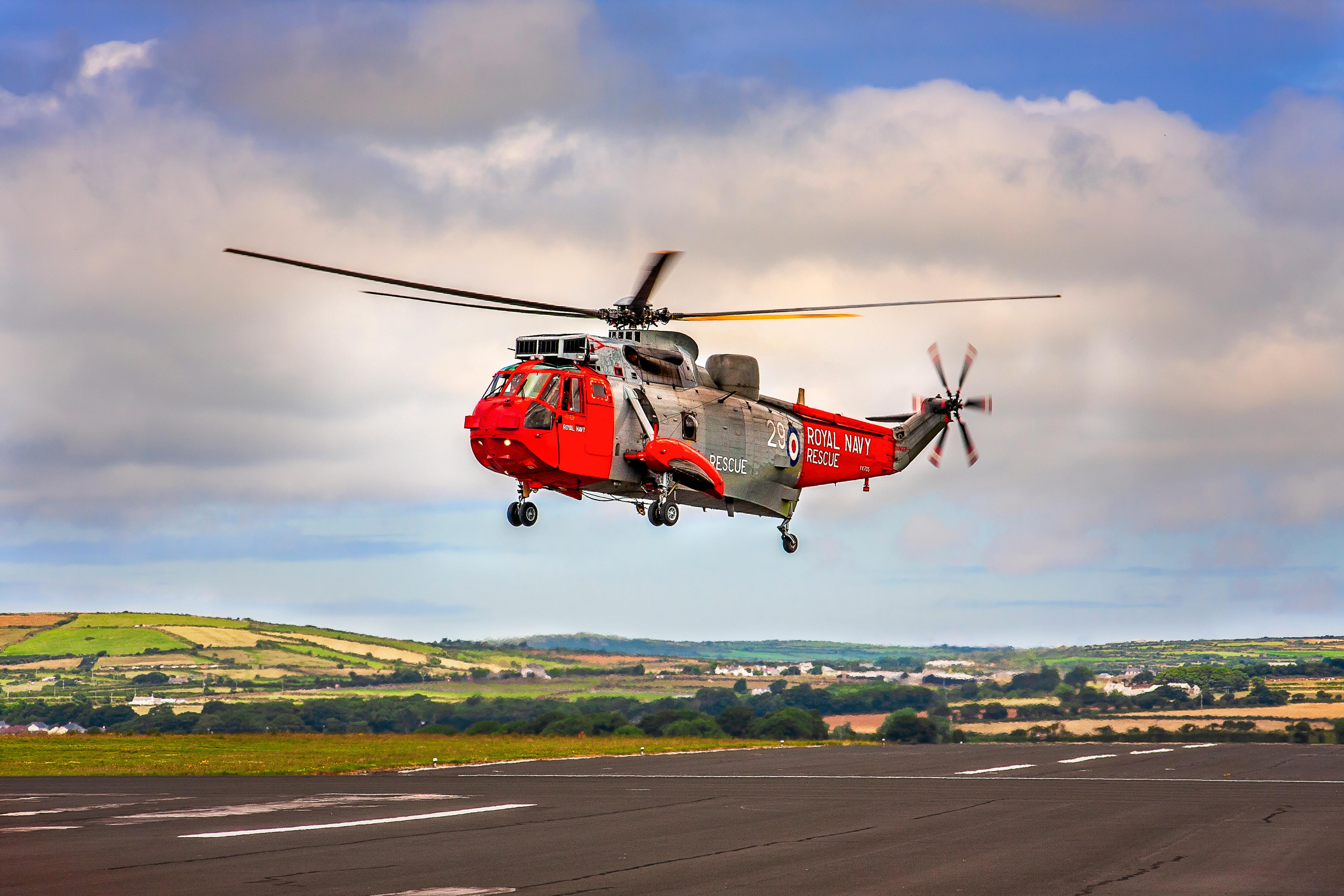 a flying navy helicopter