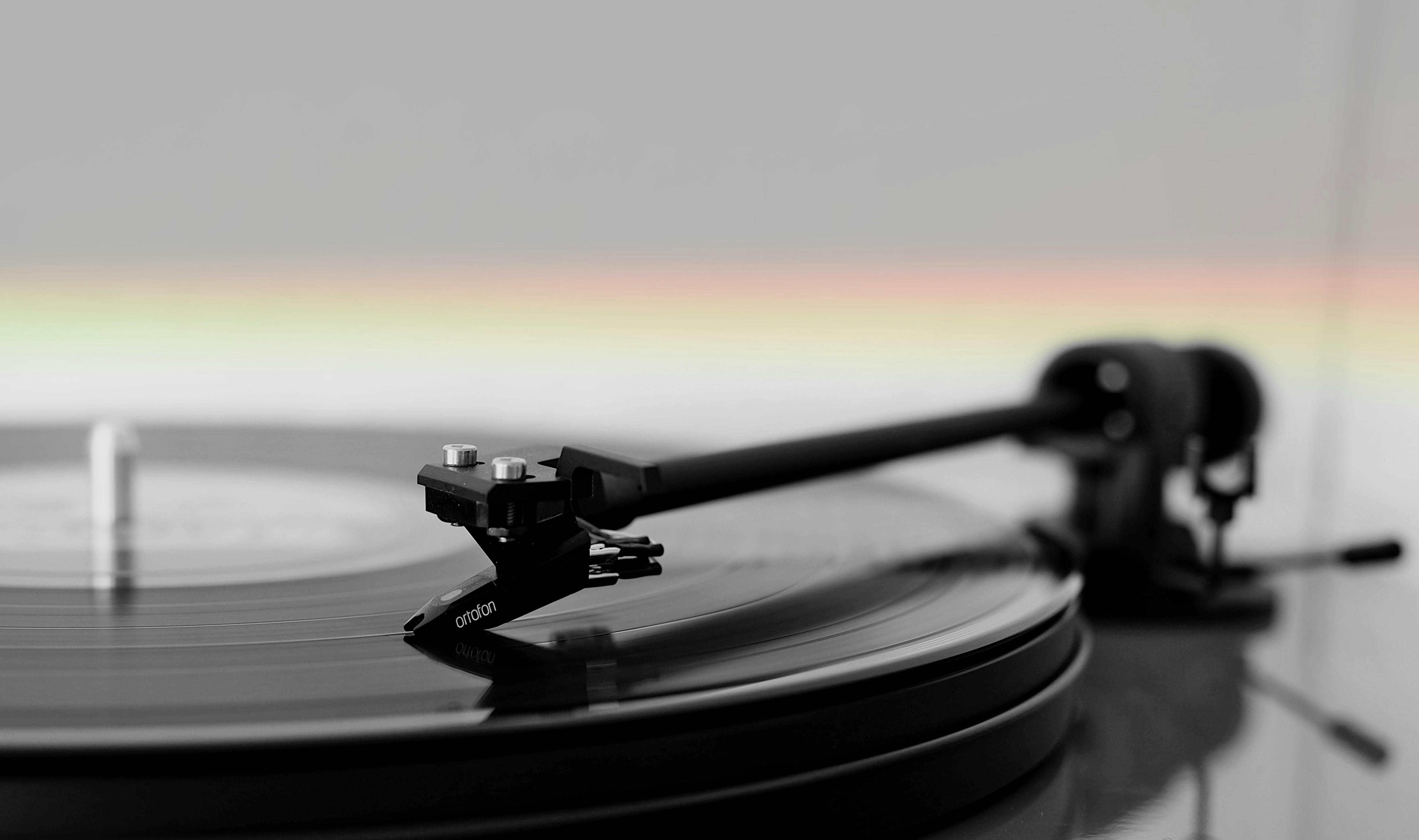 black vinyl record player in close up photography