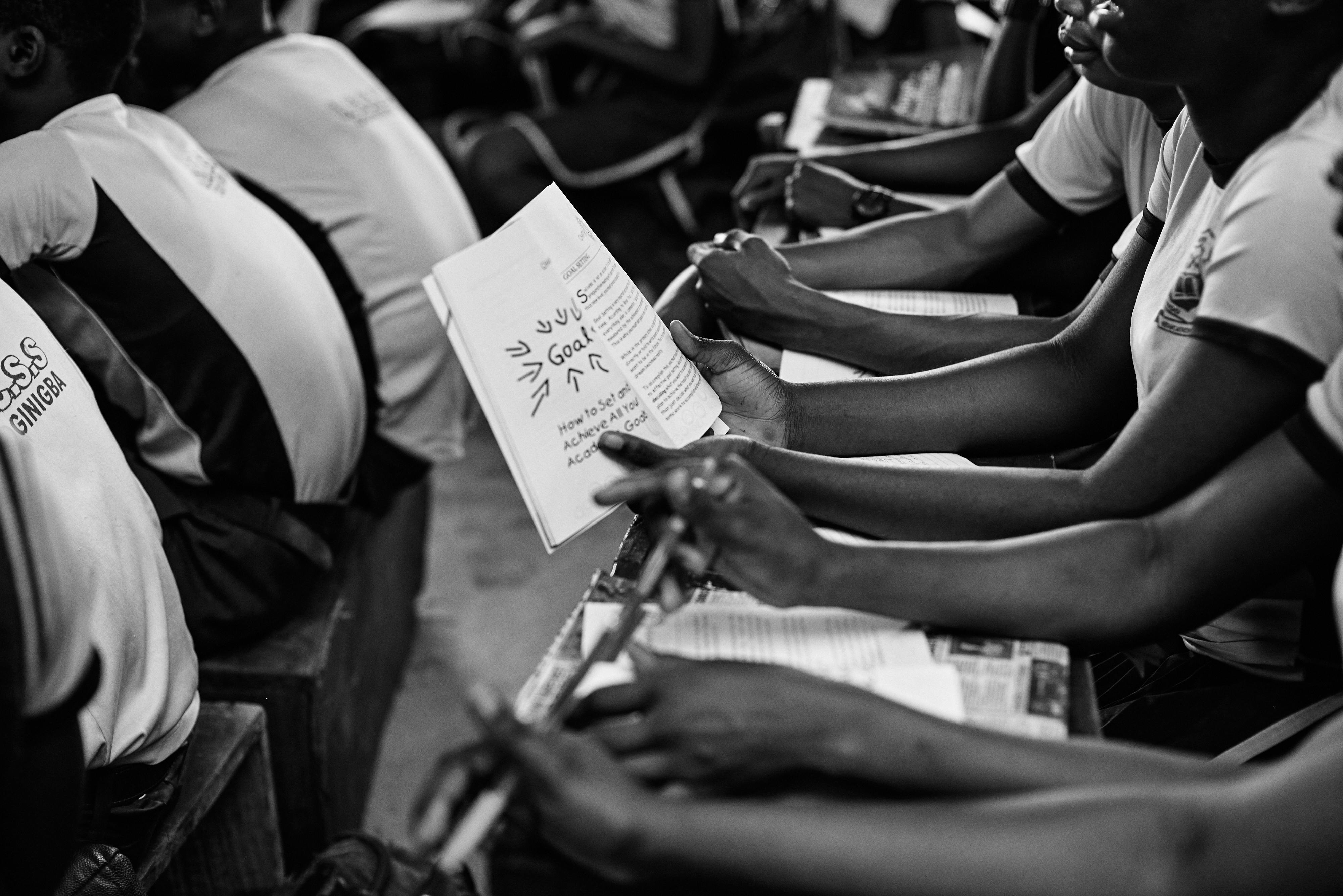 a student holding a book