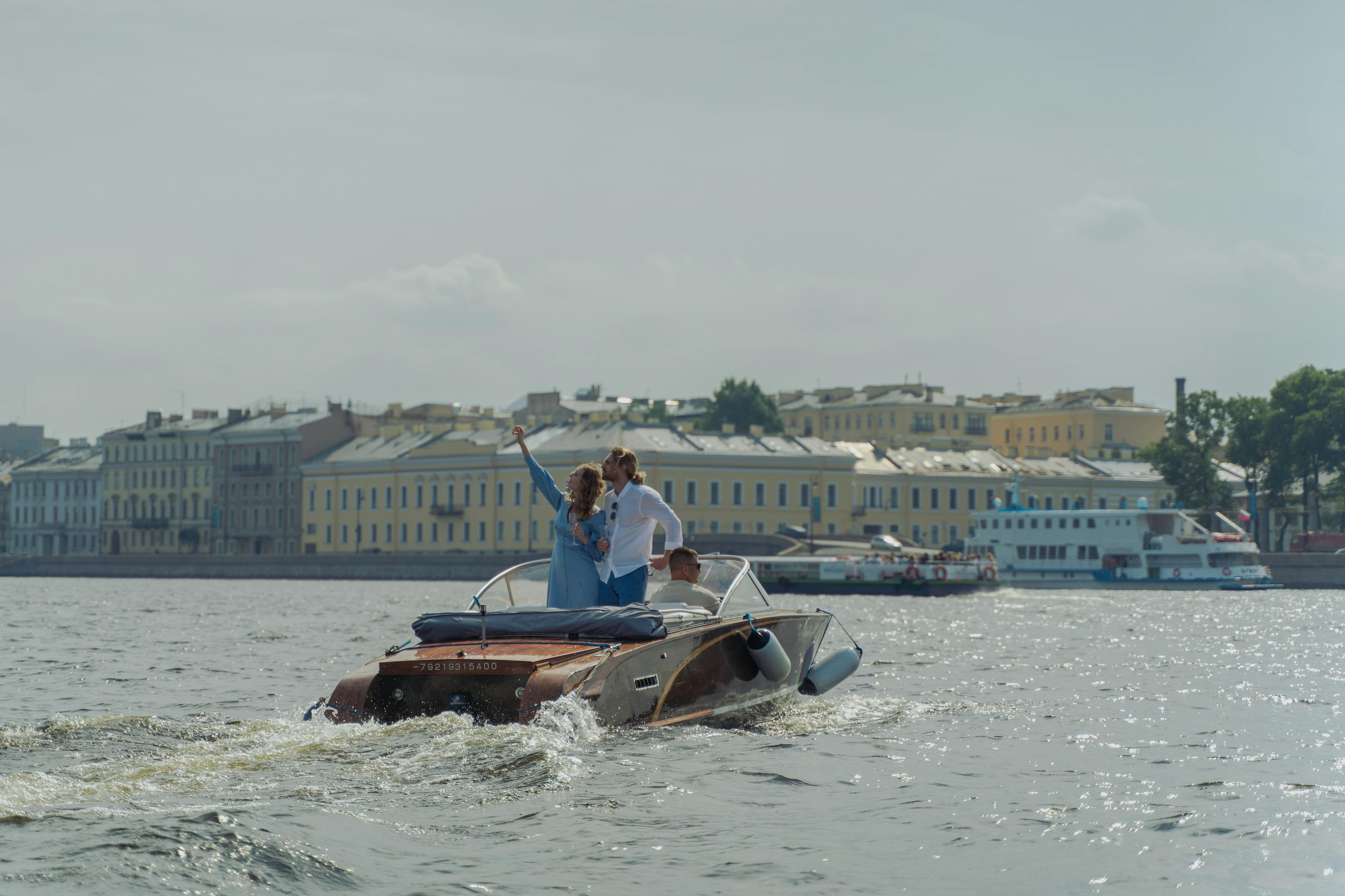 a couple sightseeing while on a boat