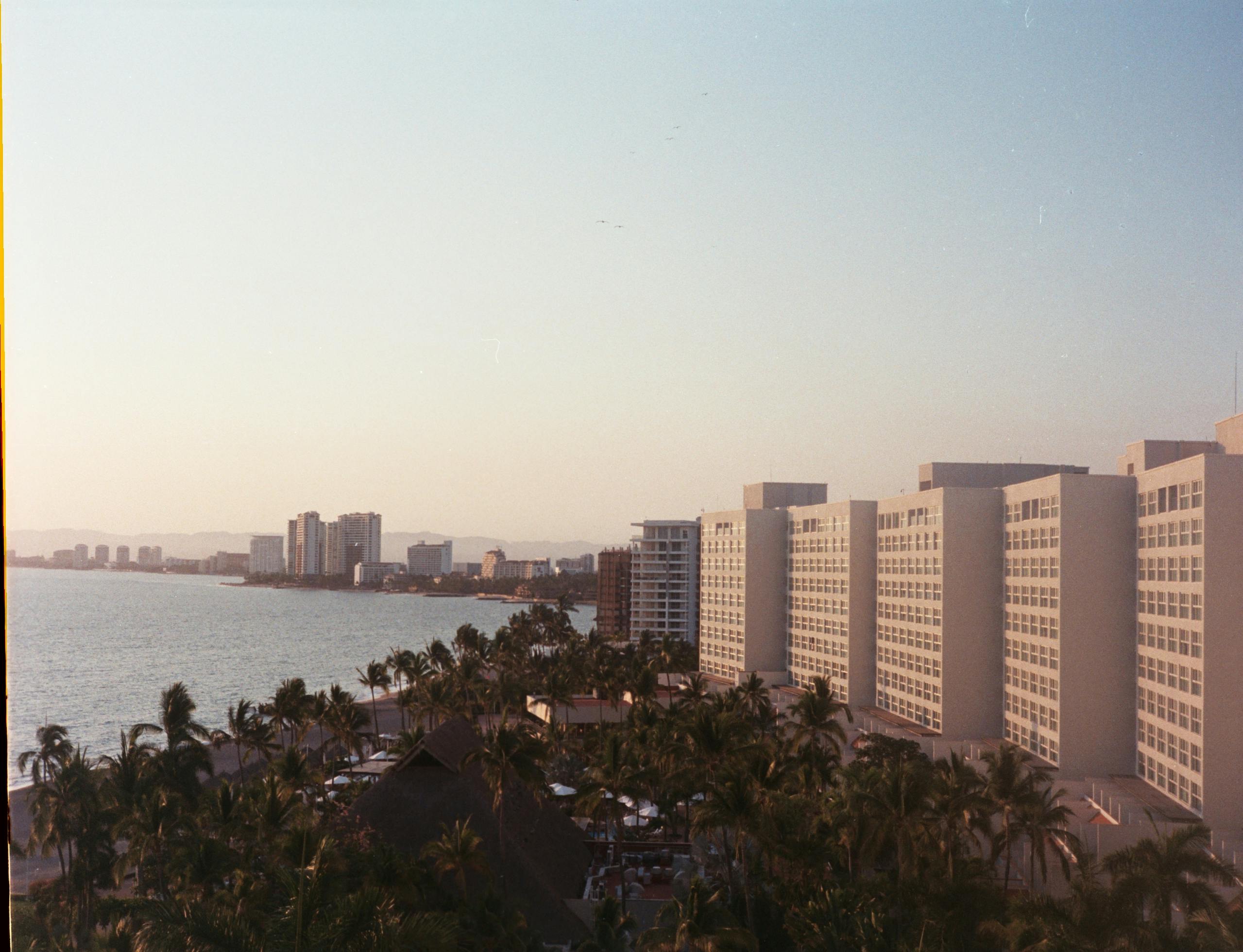 concrete buildings near the beach