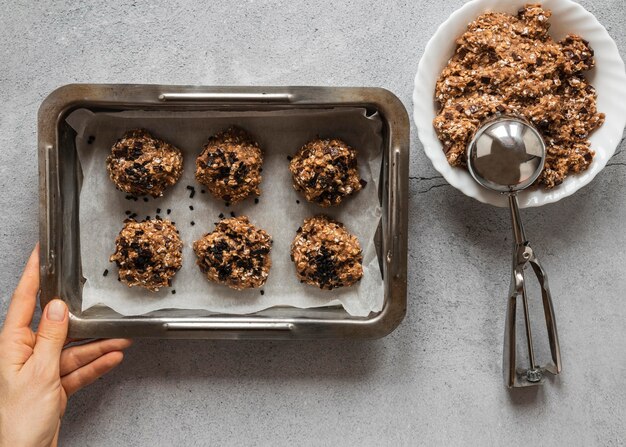 Free photo top view of food ingredients with tray and dessert mix