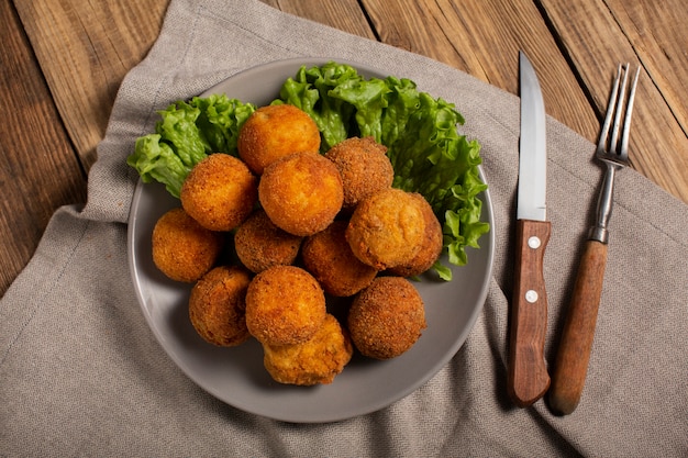 Free photo above view delicious fried food croquettes