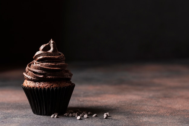 Free photo front view of cupcake with copy space