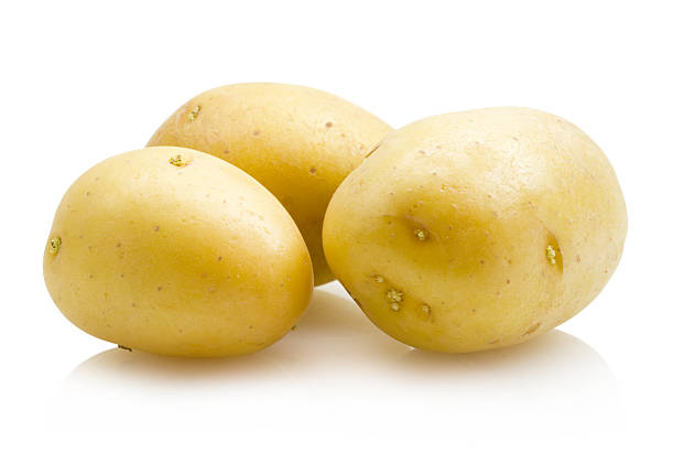 potatoes fresh golden potatoes isolated on white background weisses trüffelöl stock pictures, royalty-free photos & images